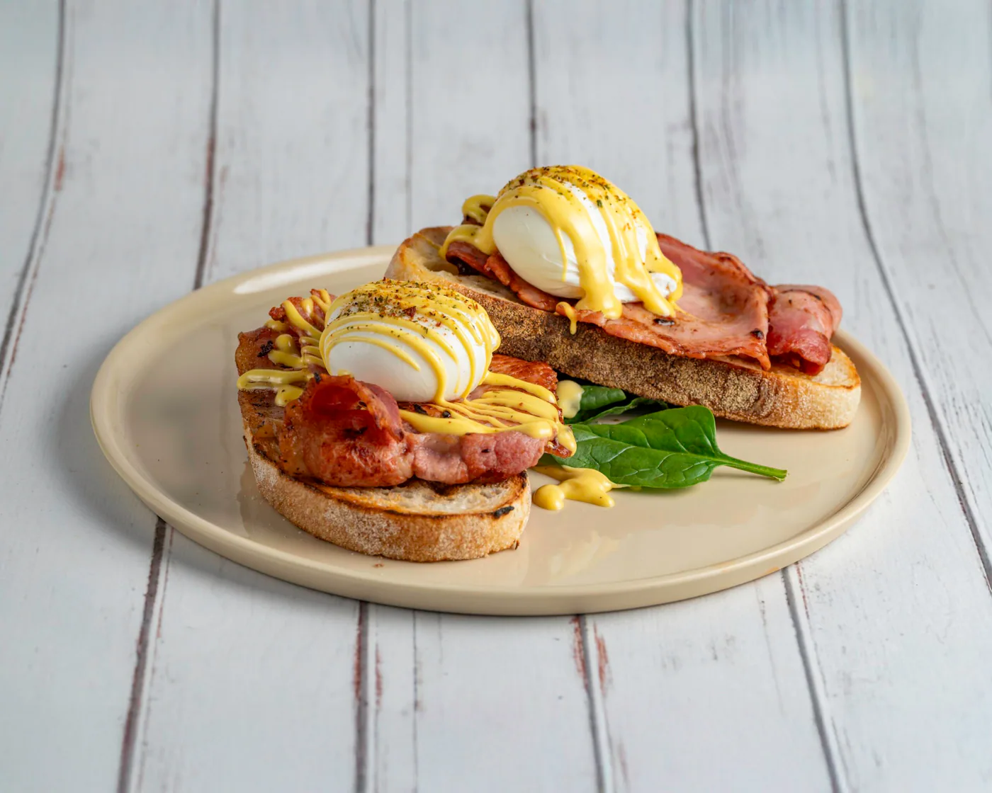 Benny Baby with poached eggs, bacon and hollandaise on sourdough